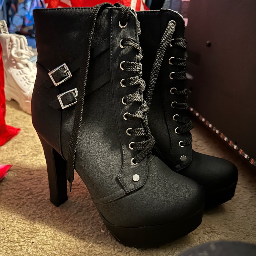 Black heeled platform booties
